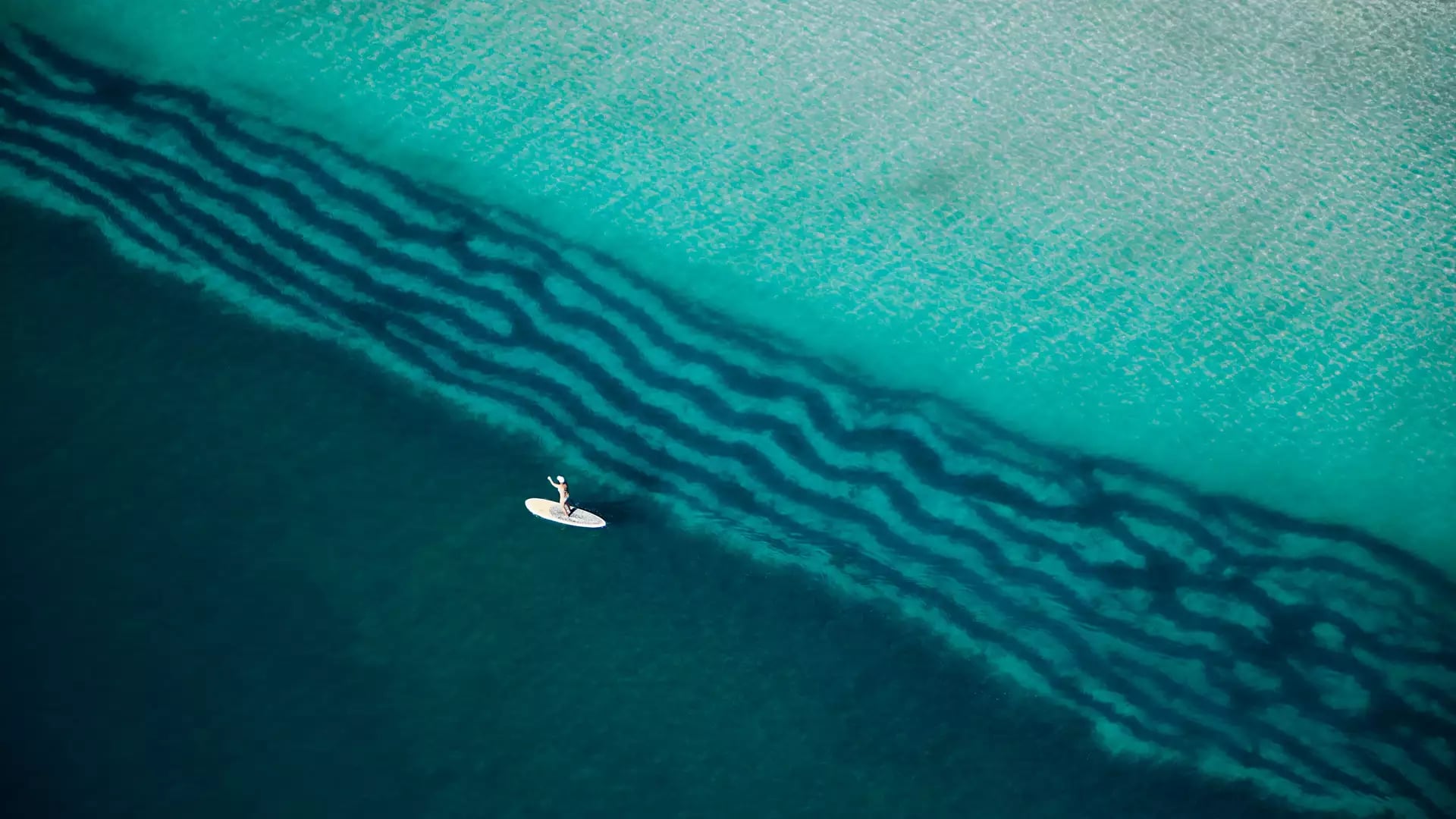 Crystal Clear water paddle boarding on Hyams Beach Jervis Bay NSW 