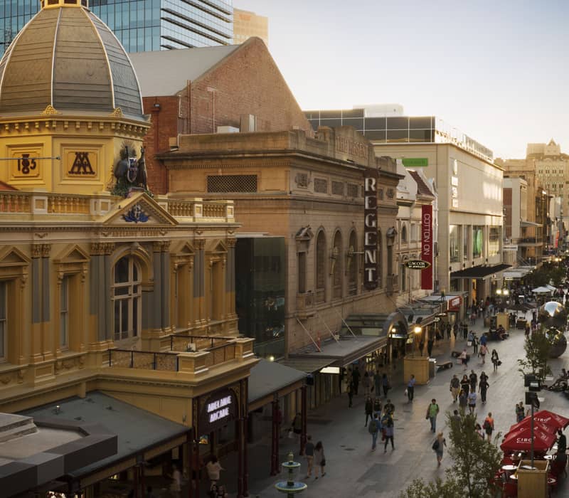 Aerial view of the Rundle Mall pedestrian precinct in Adelaide showing historic rooftops and shoppers below.