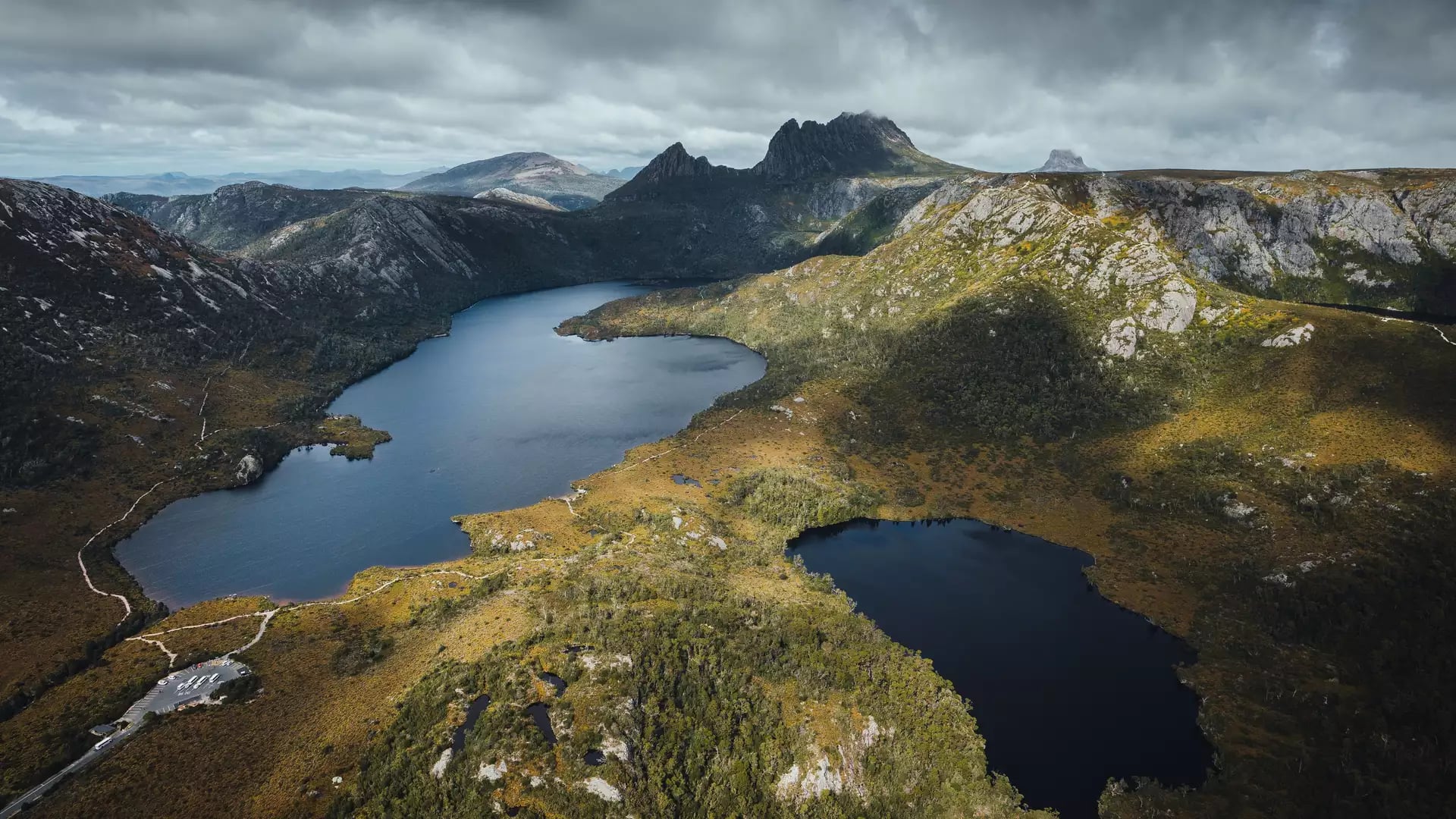 High angle aerial view of Dove Lake and surrounding alpine vegetation in Cradle Mountain National Park.