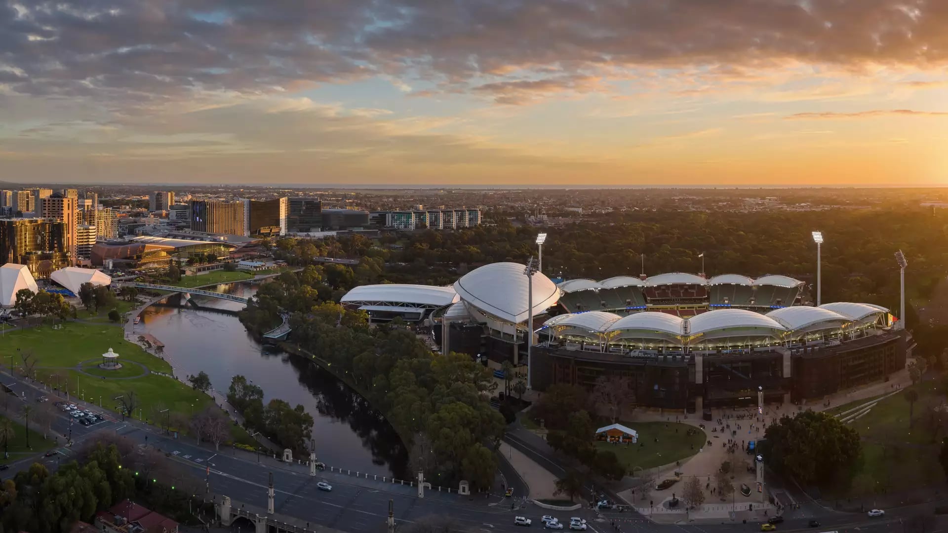 Sunset over the Adelaide Oval stadium and river precinct in South Australia.