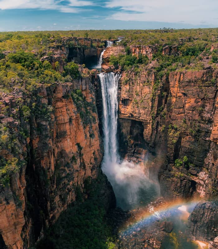 Nothern territory tourism kakadu jimjim falls Dec 2025 ariel shot of the falls with rainbow, scenic 