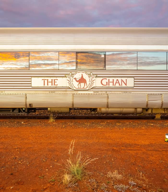 Close up of The Ghan's train carriage with it's signature logo.