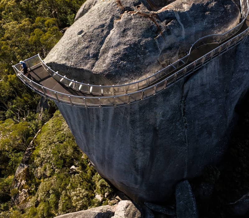 A high-angle view of the Granite Skywalk on Castle Rock in Porongurup National Park, Western Australia.